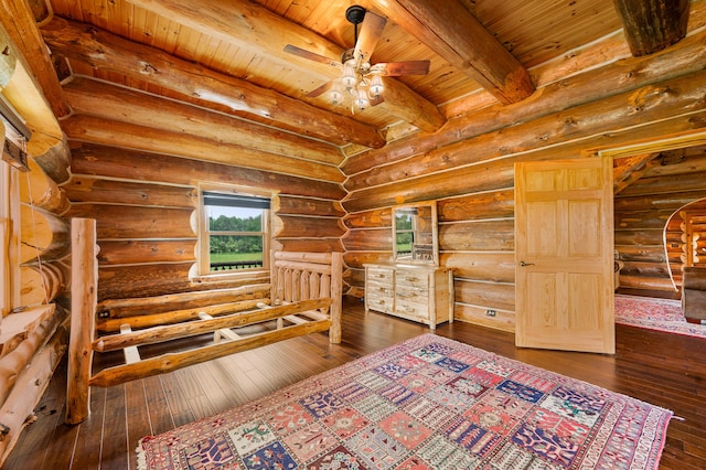4450 50th Ave, Sears, MI 49679 - unfurnished bedroom with wood ceiling with exposed beams and dark wood finished floors