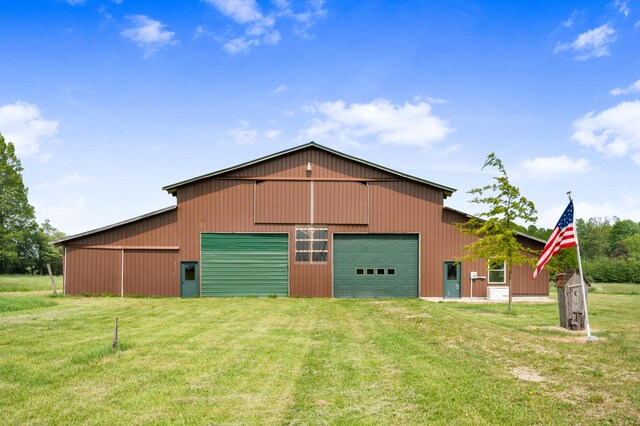 4450 50th Ave, Sears, MI 49679 - view of pole building featuring a lawn