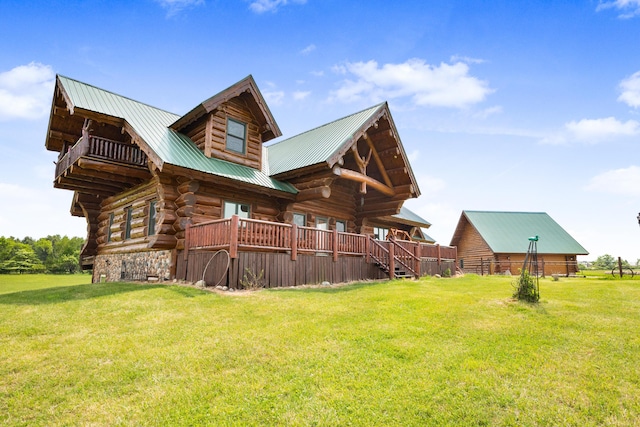 4450 50th Ave, Sears, MI 49679 - rear view of property with a lawn, log exterior, and metal roof