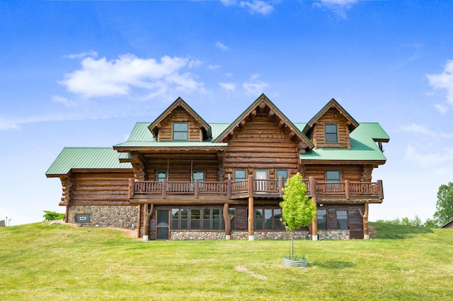 4450 50th Ave, Sears, MI 49679 - back of house featuring a yard, log exterior, and metal roof