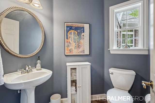 7149 Armadale Ct NE, Belmont, MI 49306 - bathroom featuring toilet and baseboards
