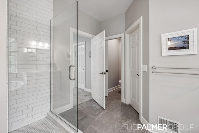 7149 Armadale Ct NE, Belmont, MI 49306 - full bath with a shower stall, toilet, and baseboards