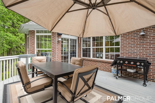 7149 Armadale Ct NE, Belmont, MI 49306 - wooden terrace featuring outdoor dining area