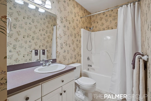 7149 Armadale Ct NE, Belmont, MI 49306 - bathroom with toilet, vanity, tile patterned flooring, shower / tub combo with curtain, and wallpapered walls