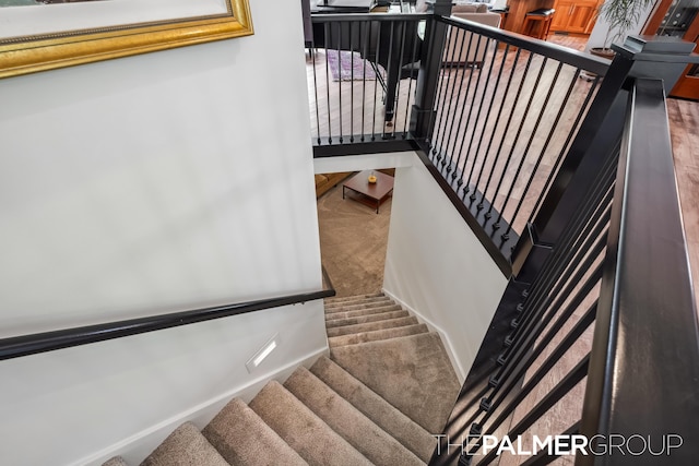 7149 Armadale Ct NE, Belmont, MI 49306 - stairs with carpet floors