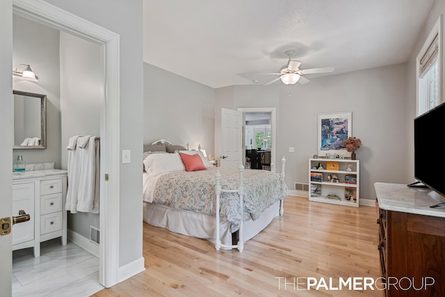 7149 Armadale Ct NE, Belmont, MI 49306 - bedroom with baseboards, multiple windows, and a ceiling fan