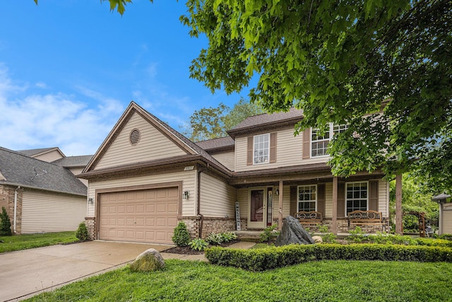 3311 Hickory Dr, Lake Orion, MI 48359 - view of front of property featuring covered porch, brick siding, a garage, concrete driveway, and a front yard