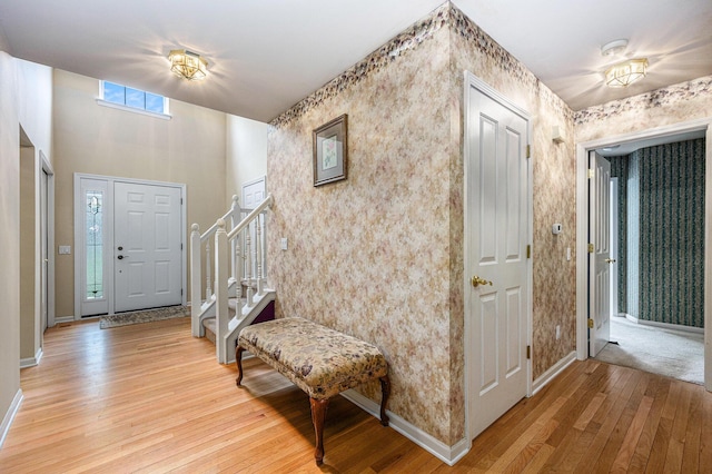 3311 Hickory Dr, Lake Orion, MI 48359 - entryway featuring light wood-style floors, baseboards, and wallpapered walls