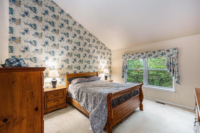 3311 Hickory Dr, Lake Orion, MI 48359 - bedroom featuring wallpapered walls, lofted ceiling, light carpet, and baseboards