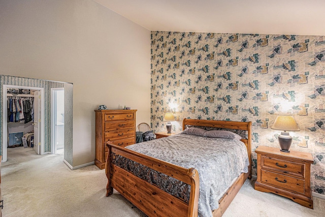 3311 Hickory Dr, Lake Orion, MI 48359 - bedroom featuring vaulted ceiling, carpet floors, wallpapered walls, baseboards, and a closet