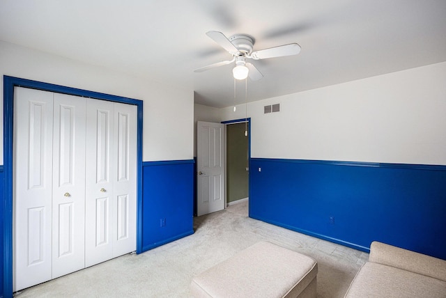 3311 Hickory Dr, Lake Orion, MI 48359 - unfurnished bedroom featuring carpet floors, a closet, and a ceiling fan