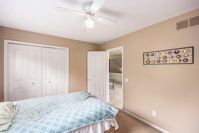 3311 Hickory Dr, Lake Orion, MI 48359 - carpeted bedroom featuring a closet, baseboards, and ceiling fan