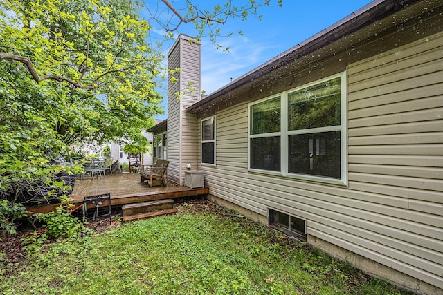 3311 Hickory Dr, Lake Orion, MI 48359 - view of green lawn with a wooden deck