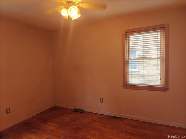 8998 Quandt Ave, Allen Park, MI 48101 - unfurnished room with wood finished floors, ceiling fan, and baseboards