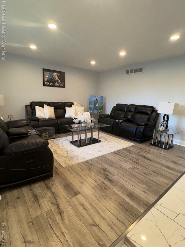 38217 Pinebrook Dr, Sterling Heights, MI 48310 - living room featuring recessed lighting and wood finished floors