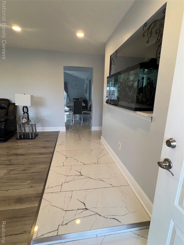 38217 Pinebrook Dr, Sterling Heights, MI 48310 - hall featuring baseboards, recessed lighting, and marble finish floors