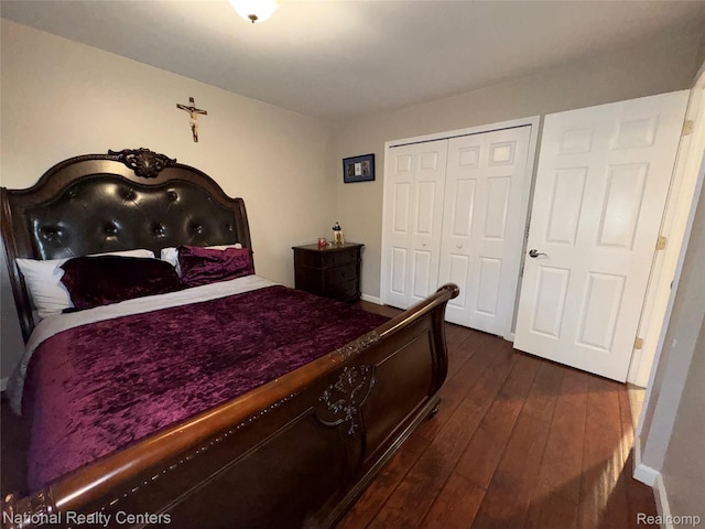 38217 Pinebrook Dr, Sterling Heights, MI 48310 - bedroom featuring a closet, dark wood-style floors, and baseboards