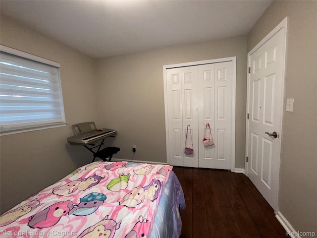 38217 Pinebrook Dr, Sterling Heights, MI 48310 - bedroom with dark wood-style floors and a closet