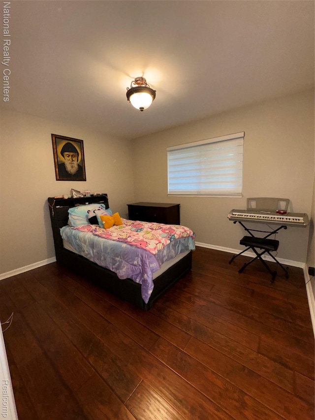 38217 Pinebrook Dr, Sterling Heights, MI 48310 - bedroom featuring hardwood / wood-style flooring and baseboards