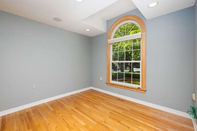 4936 Ravine Ct, Ann Arbor, MI 48105 - spare room featuring baseboards, light wood-style floors, and recessed lighting