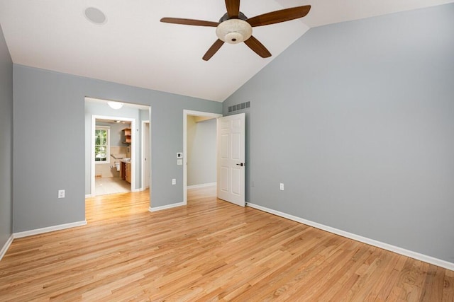 4936 Ravine Ct, Ann Arbor, MI 48105 - unfurnished bedroom featuring vaulted ceiling, light wood finished floors, baseboards, ensuite bathroom, and a ceiling fan