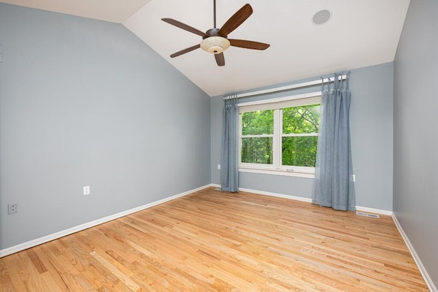 4936 Ravine Ct, Ann Arbor, MI 48105 - empty room featuring vaulted ceiling, a ceiling fan, light wood-style flooring, and baseboards