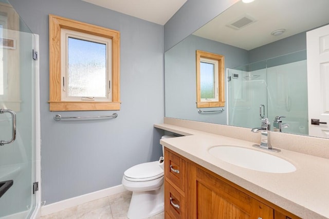 4936 Ravine Ct, Ann Arbor, MI 48105 - full bathroom with vanity, a stall shower, baseboards, and toilet