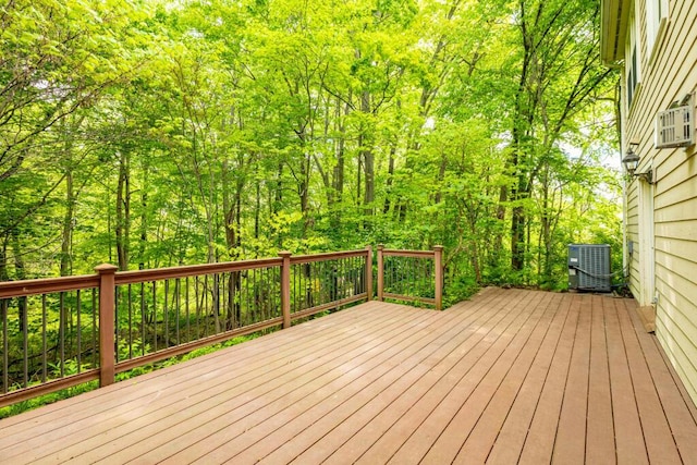 4936 Ravine Ct, Ann Arbor, MI 48105 - deck featuring cooling unit and a wooded view