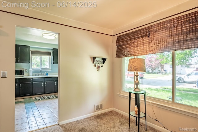 5633 Detroit St, Flat Rock, MI 48125 - hall featuring baseboards and light carpet