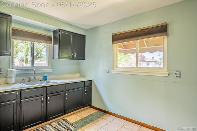5633 Detroit St, Flat Rock, MI 48125 - kitchen featuring plenty of natural light, light tile patterned floors, and light countertops