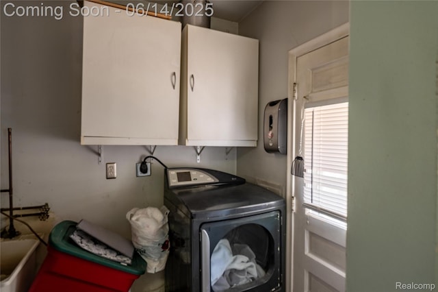 5633 Detroit St, Flat Rock, MI 48125 - laundry area featuring washer / dryer and cabinet space