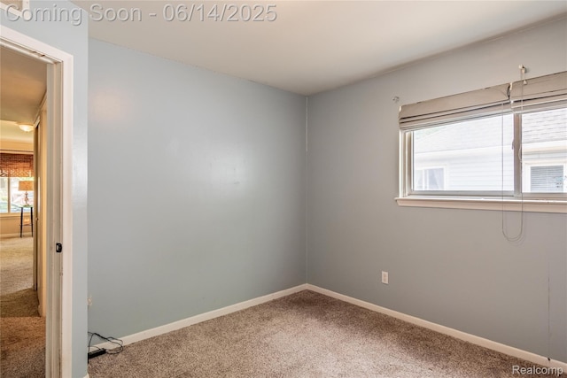 5633 Detroit St, Flat Rock, MI 48125 - carpeted empty room featuring healthy amount of natural light