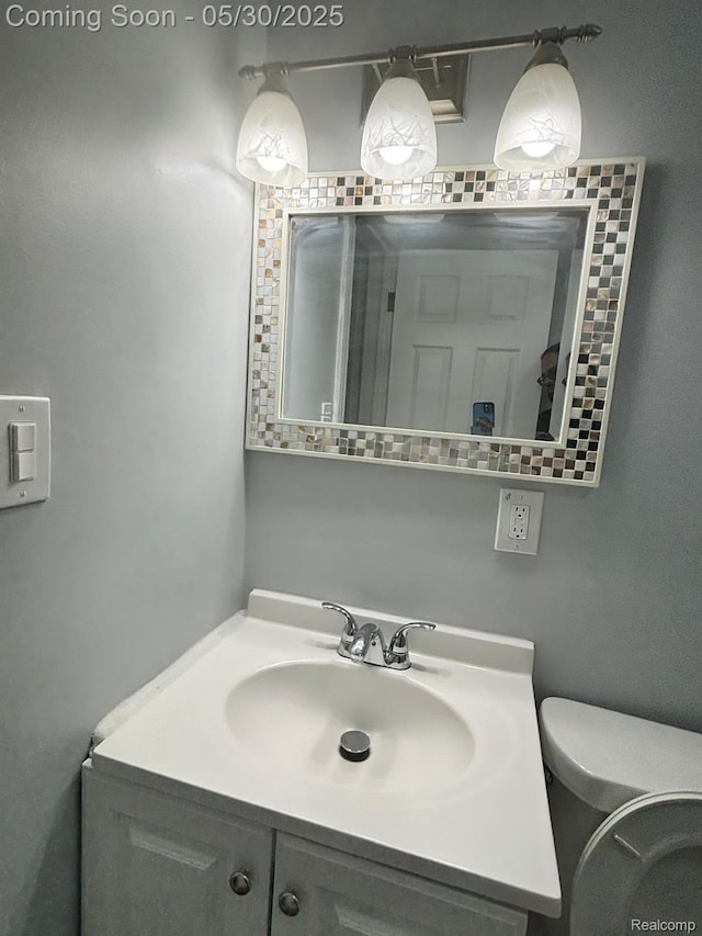 11005 Dodge Ave, Warren, MI 48089 - bathroom featuring vanity and toilet