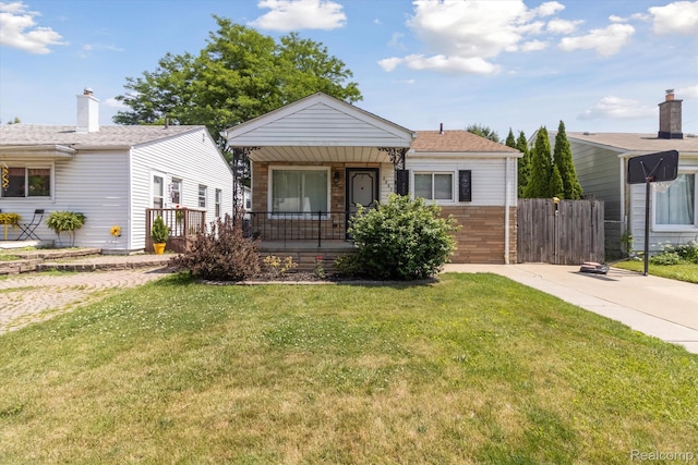 2562 Downing St, Melvindale, MI 48122 - view of front of house with a porch