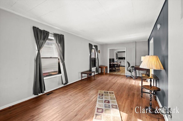 902 Turner Ave, Muskegon, MI 49442 - living room with wood finished floors and baseboards
