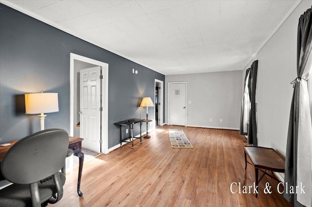 902 Turner Ave, Muskegon, MI 49442 - living area featuring wood finished floors and baseboards