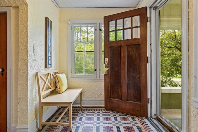 10251 Smith Rd, Union Pier, MI 49129 - foyer with a textured wall, plenty of natural light, baseboards, and tile patterned floors