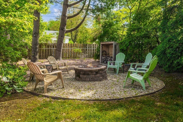 10251 Smith Rd, Union Pier, MI 49129 - view of patio / terrace with a fire pit