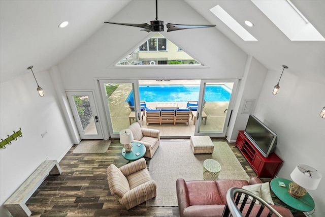 10251 Smith Rd, Union Pier, MI 49129 - living area featuring a skylight, high vaulted ceiling, wood finished floors, recessed lighting, and a ceiling fan