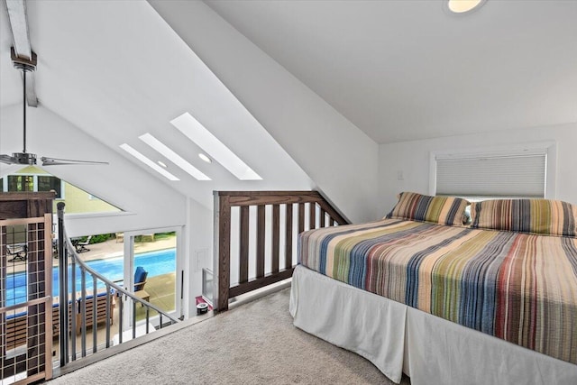 10251 Smith Rd, Union Pier, MI 49129 - carpeted bedroom featuring a skylight, vaulted ceiling, and access to outside