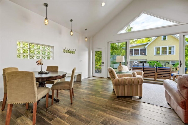 10251 Smith Rd, Union Pier, MI 49129 - dining space featuring dark wood-type flooring and high vaulted ceiling