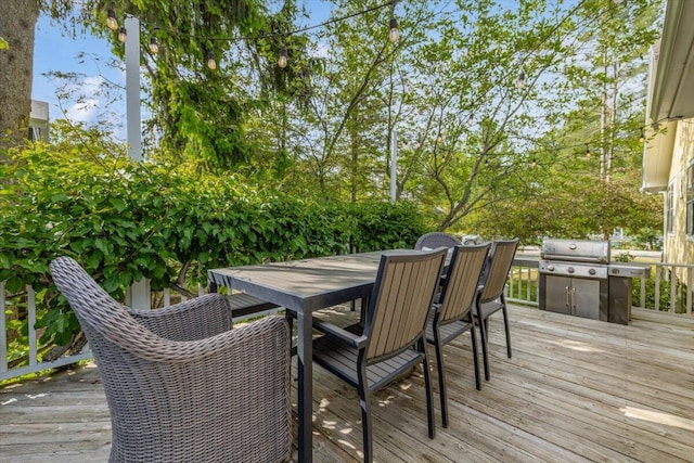 10251 Smith Rd, Union Pier, MI 49129 - wooden terrace with a grill and outdoor dining space