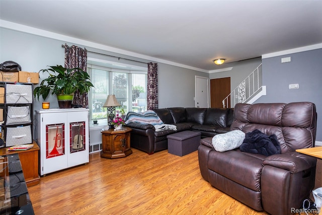 23415 Thornton St, Clinton Township, MI 48035 - living area featuring stairs and light wood finished floors