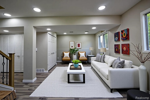 2626 Winter Dr, Troy, MI 48083 - living room with dark wood-style flooring, baseboards, recessed lighting, and stairs
