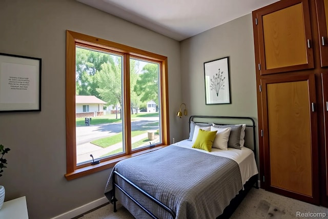 2626 Winter Dr, Troy, MI 48083 - bedroom featuring baseboards and light colored carpet
