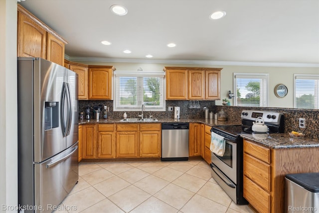 27820 29 Mile Rd, Lenox, MI 48048 - kitchen with stainless steel appliances, a sink, a peninsula, backsplash, and light tile patterned floors