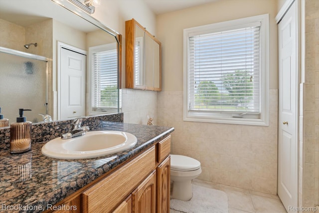 27820 29 Mile Rd, Lenox, MI 48048 - bathroom featuring healthy amount of natural light, vanity, a shower stall, tile walls, and tile patterned flooring