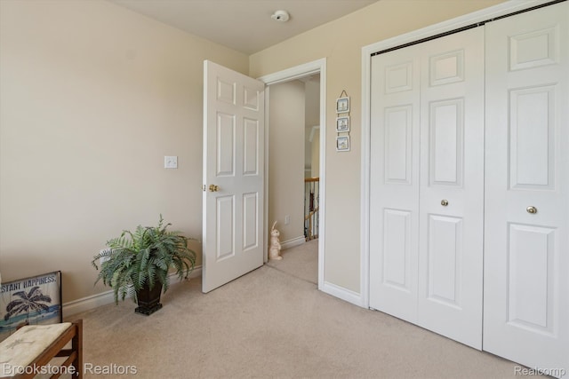 27820 29 Mile Rd, Lenox, MI 48048 - bedroom featuring light colored carpet, a closet, and baseboards