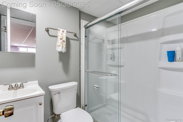 41342 N Maplewood Dr, Canton, MI 48187 - bathroom featuring a shower stall, vanity, and toilet