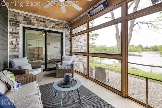 1585 Kriss Crossing Rd, Brighton, MI 48114 - sunroom / solarium featuring ceiling fan and a water view